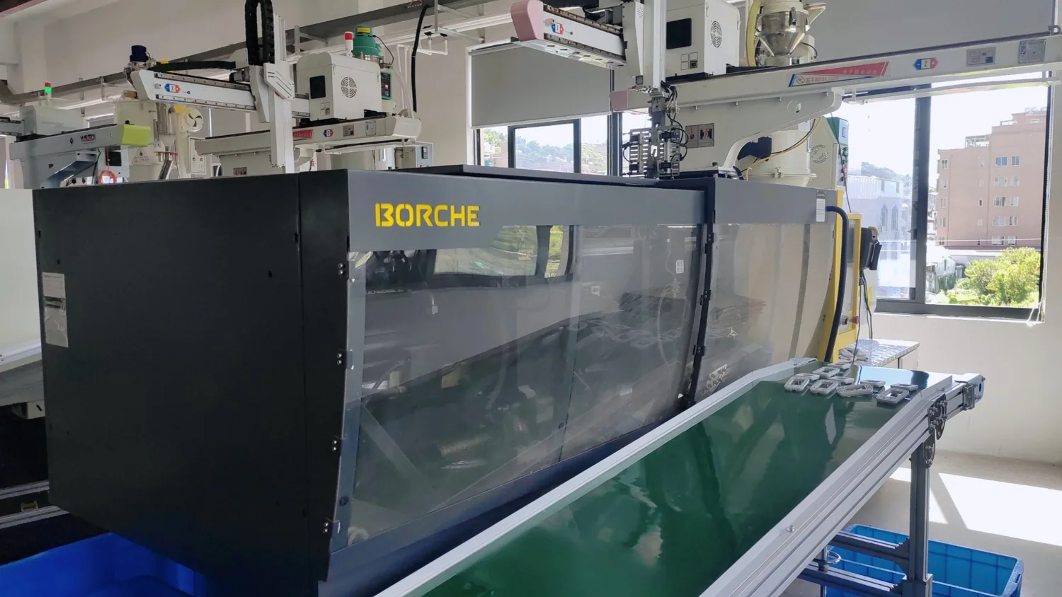 Injection molding production line for electrical boxes